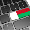 le drapeau de Madagascar sur un clavier d'ordinateur - externalisation Madagascar - Buro Services